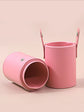 Set de 15 brochas de maquillaje rosas con bote